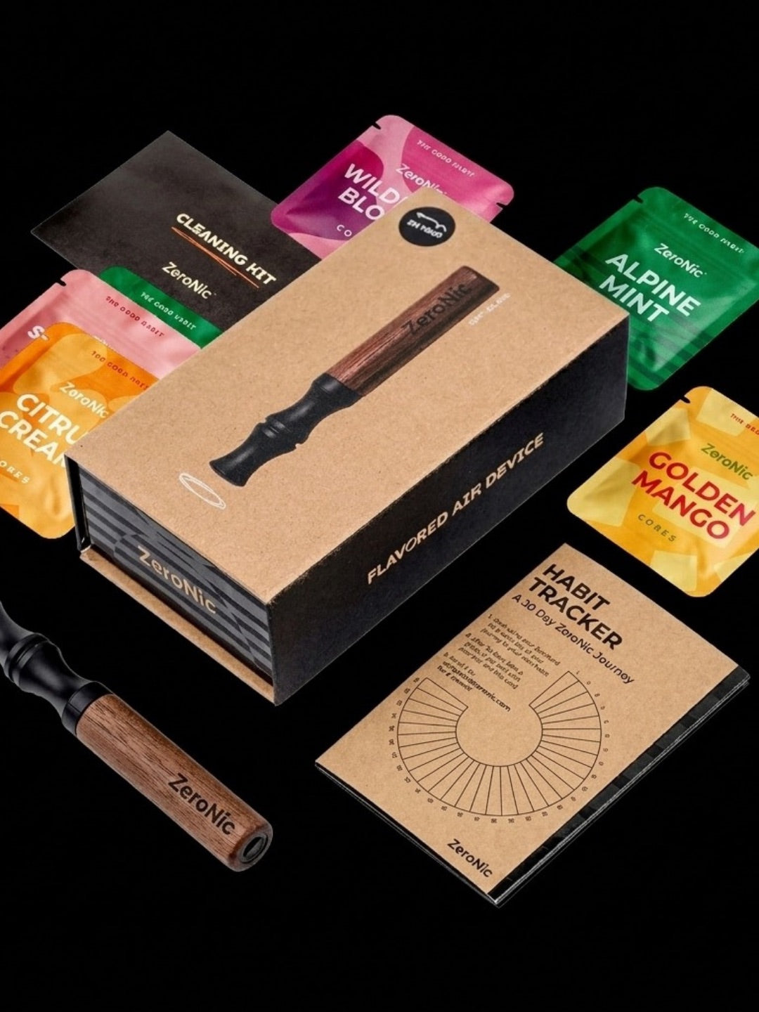 The ZeroNic flavored-air device with its box, flavor sachets, cleaning kit and habit tracker